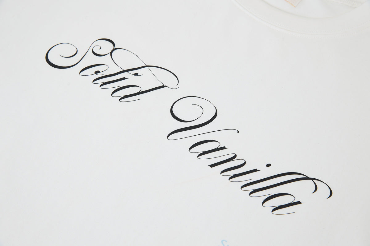 "SV Alphabet- Solid Vanilla" Tee by Sultry Virgin