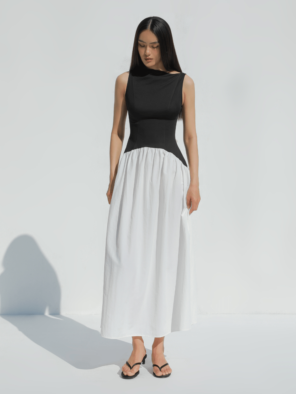 Black & White Sleeveless Contrast Dress by COCOSIN