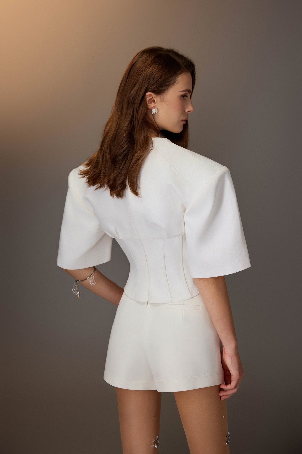 White Puff-sleeve Corset Top by Keira Tong