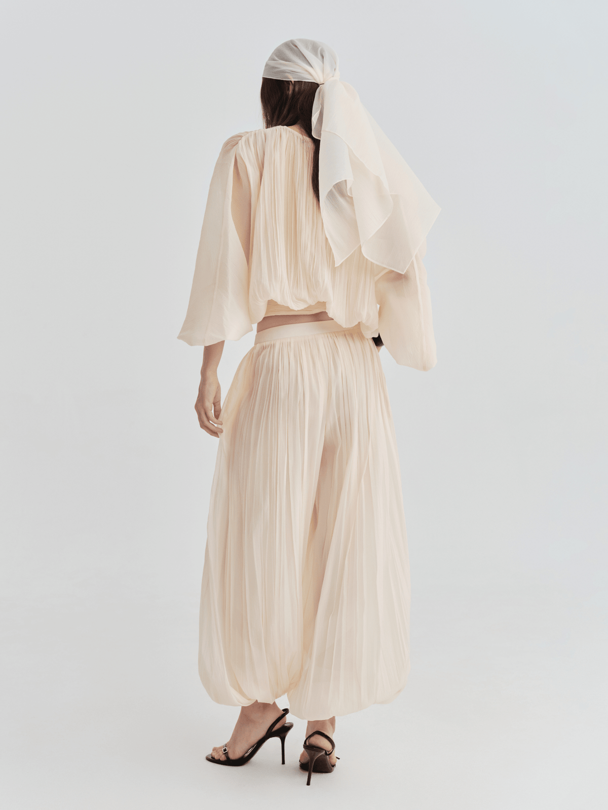 Sheer Pleated Blouson Top by COCOSIN