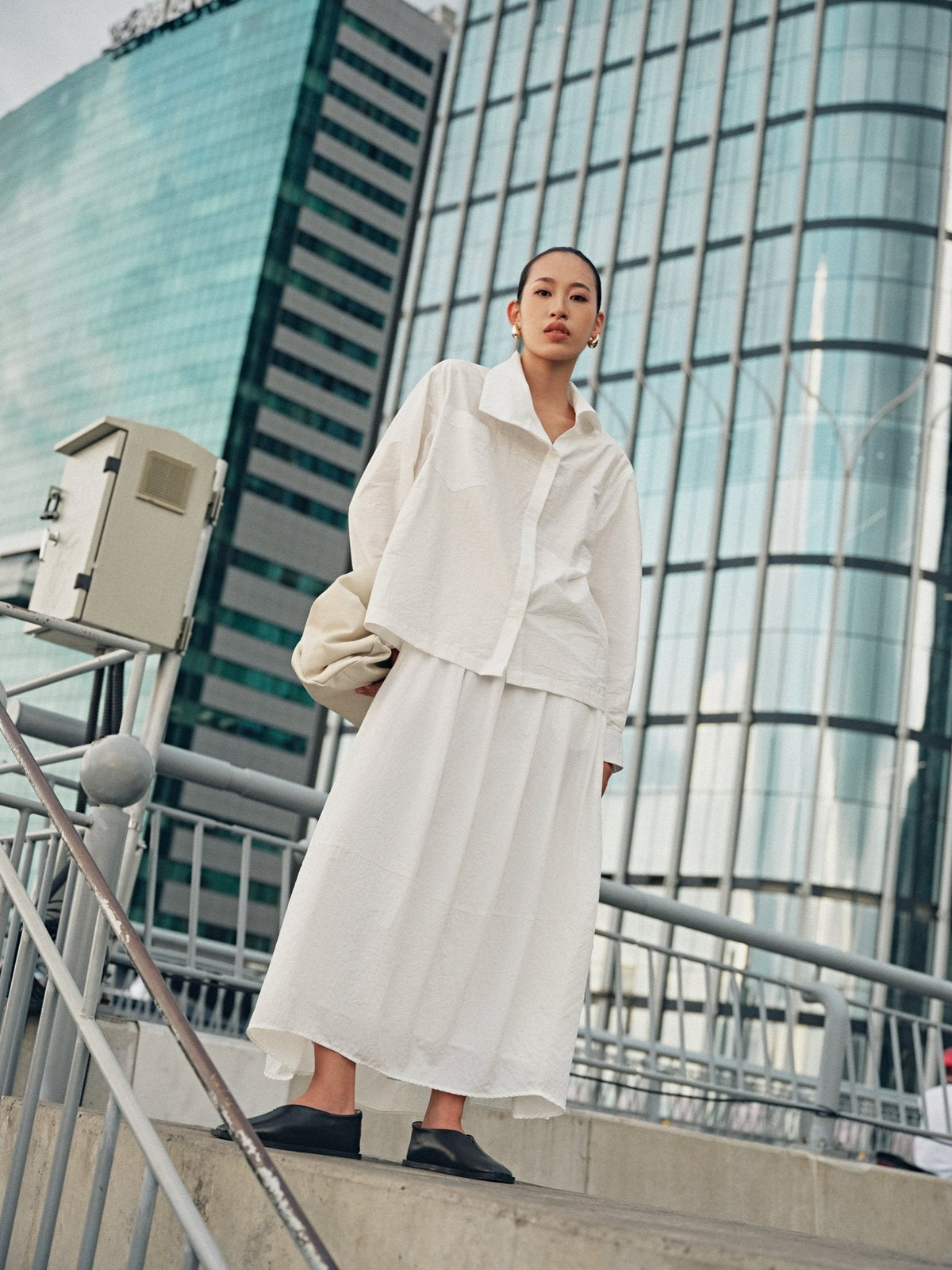 White Midi Skirt by COCOSIN